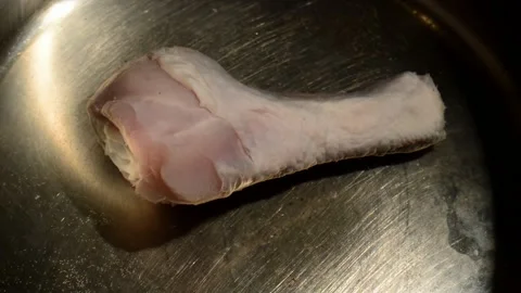 Chicken drumstick is being boiled Stock Footage 273606008