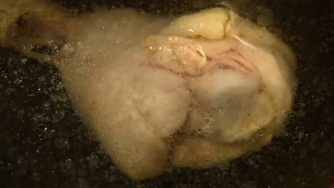 Chicken drumstick is being boiled Video stock 302137182