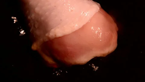 Chicken drumstick is being prepared Stockbeeldmateriaal 302120729