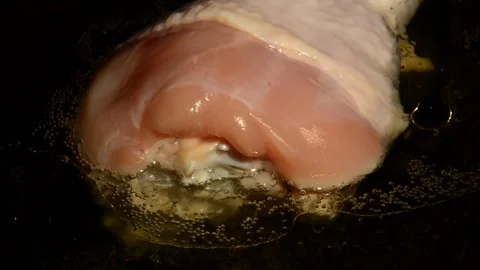 Chicken drumstick is being prepared Видео 302216996
