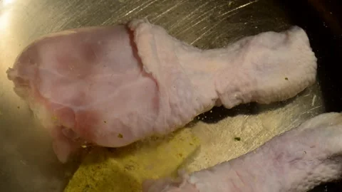 Chicken drumsticks is being boiled Stock Footage 273530489