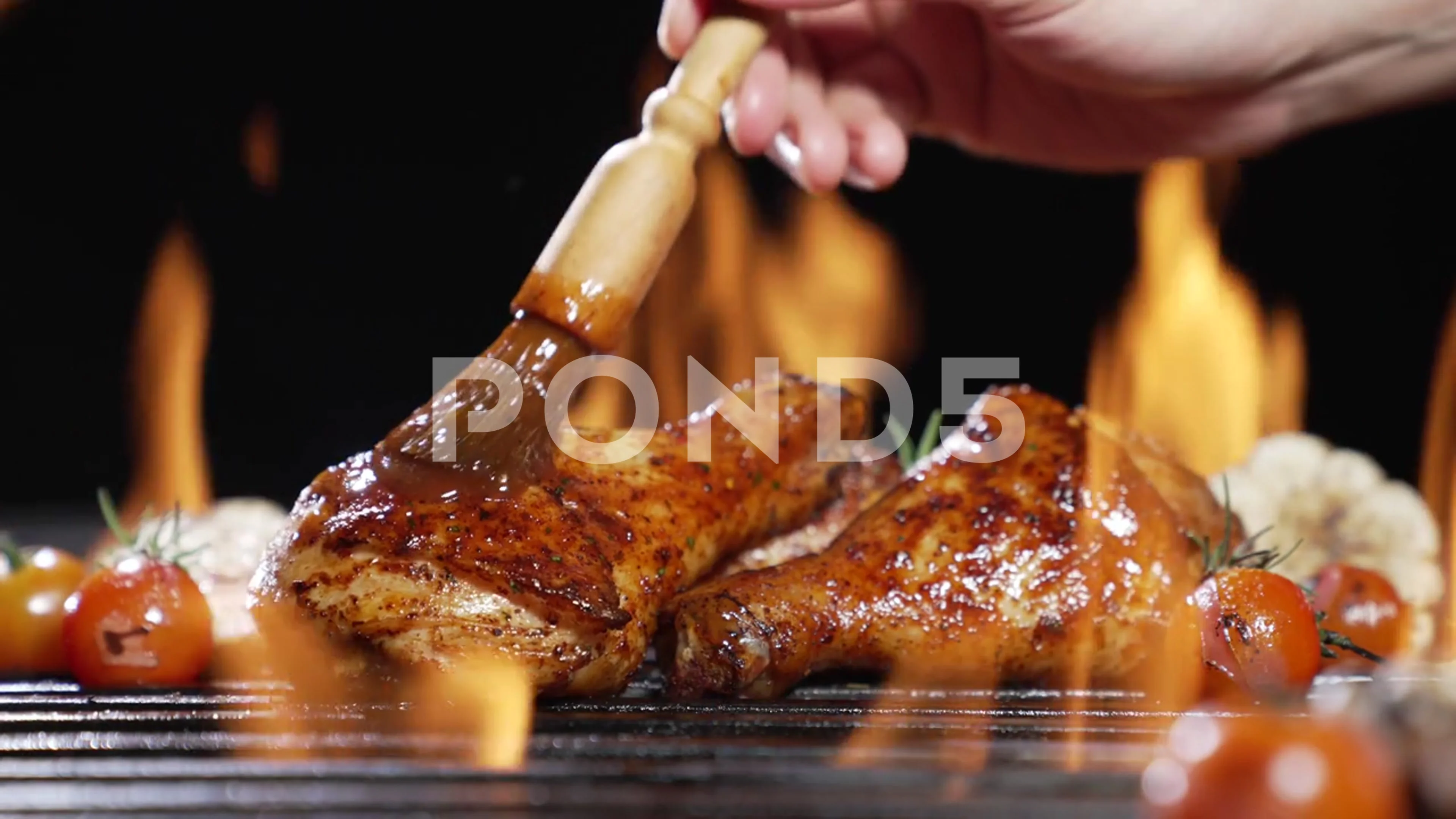 Chicken drumsticks or legs grilled on Stock Video Pond5