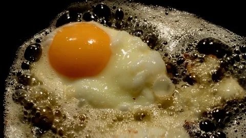 Chicken egg are fried Stock Footage 272194822