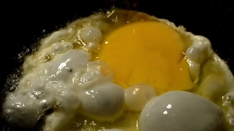 Chicken egg are fried Stock Footage 273273339