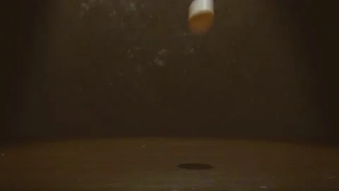 Chicken egg breaks from falling onto a table 動画素材 130884295