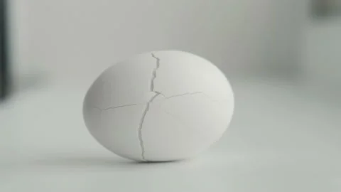 Chicken egg with cracked shell, closeup Stock Footage 181428173
