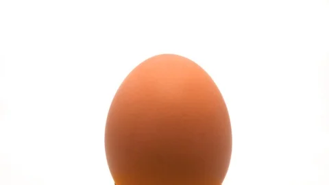 Chicken Egg Exploding Against White Background, Slow motion, Egg Exploded Stock Footage 106157052