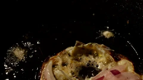 Chicken egg exploding with red onion and ham Stock Footage 273192407