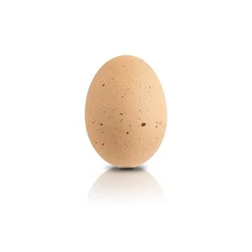 A chicken egg isolated on a white background. Close-up of a raw egg with re.. Stock Photos