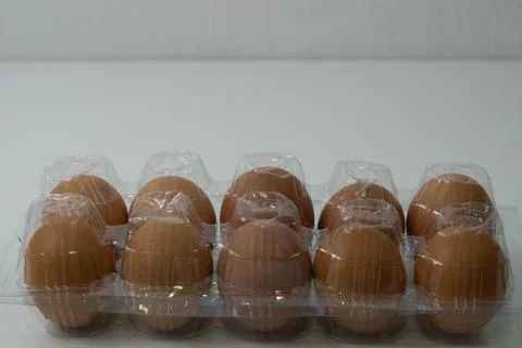 Chicken egg with plastic container on white background 34 Stock Photos