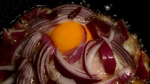 Chicken egg with red onion and ham Stock Footage 273192543