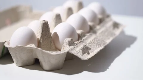 Chicken egg rotates on a white background. Stock Footage 234406167