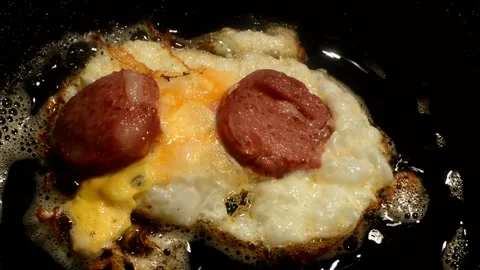 Chicken egg with sliced sausage Stock Footage 276874412