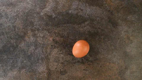 Chicken egg spinning Stock Footage 128000064