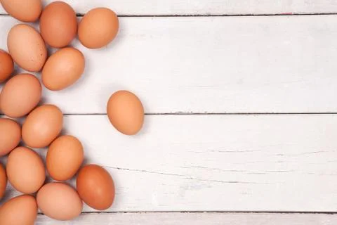 Chicken egg on wood table with space for copy .. Stock Photos