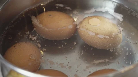 Chicken eggs are cooked in a pan close-up Stock Footage 110241572
