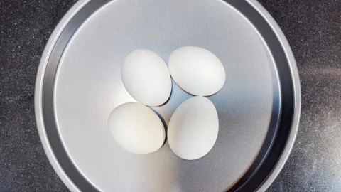 Chicken Eggs In Black Background | White Eggs In Black Plate | Eggs Video Vídeos de archivo 242903502