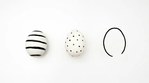 Chicken eggs with black dots, stripes, linear pattern Stock Footage 231141393