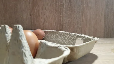 Chicken eggs. Broken Chicken Egg. Raw chicken eggs. Stock Footage 119035823
