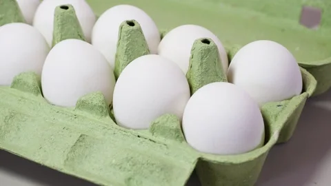Chicken eggs In cardboard box. Video stock 265736457
