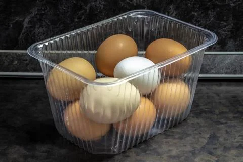 Chicken eggs in a container Stock Photos