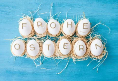 Chicken eggs with easter greeting Stock Photos