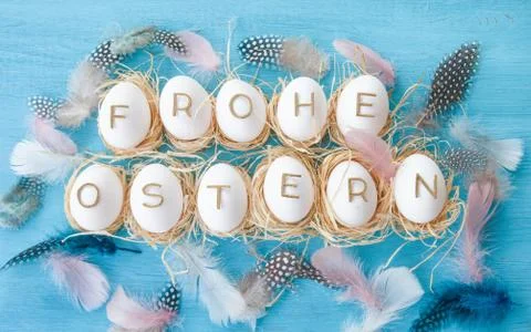 Chicken eggs with easter greeting Stock Photos
