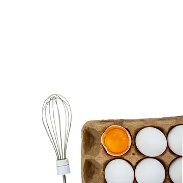 Chicken eggs in an egg carton and a whisk on a white background Stock Photos