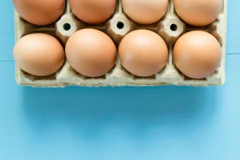 Chicken eggs in an egg cup Stock Photos