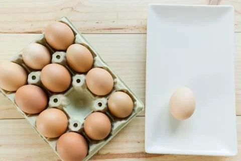 Chicken eggs in an egg cup Stock Photos