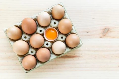 Chicken eggs in an egg cup Stock Photos