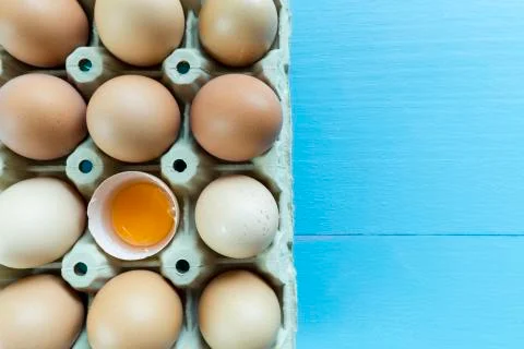 Chicken eggs in an egg cup Stock Photos