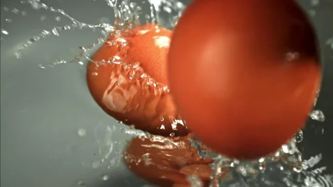 Chicken eggs fall into the pot. Filmed on a high-speed camera at 1000 fps. Stock Footage 322796188