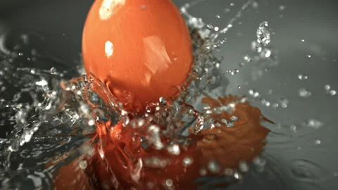 Chicken eggs fall into the pot. Filmed on a high-speed camera at 1000 fps. Stock Footage 322827244