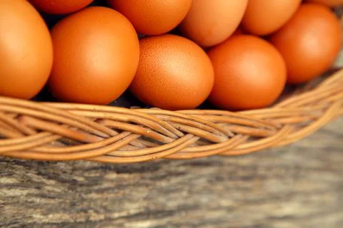 Chicken eggs on a hemp, table, straw. Stock Photos