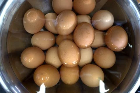 Chicken eggs in the kitchen before cooking Stock Photos