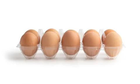 Chicken eggs in the plastic box isolated Stock Photos