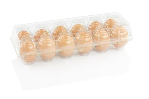 Chicken eggs in a plastic container Foto stock