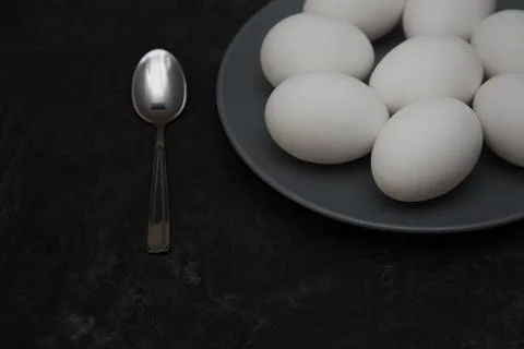 Chicken eggs on a plate Stock Photos