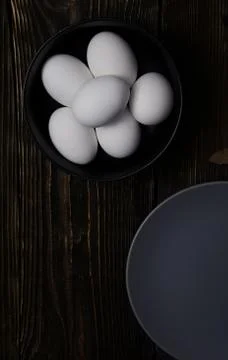 Chicken eggs in plate Stock Photos