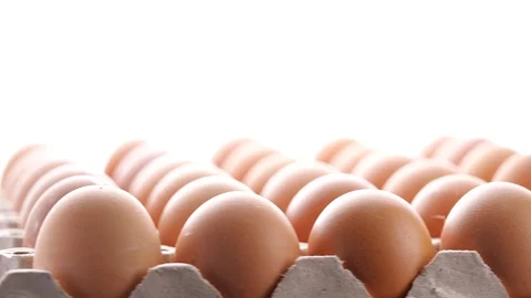 Chicken eggs rotation on white background in 4K Slow motion Stock-Footage 128334749