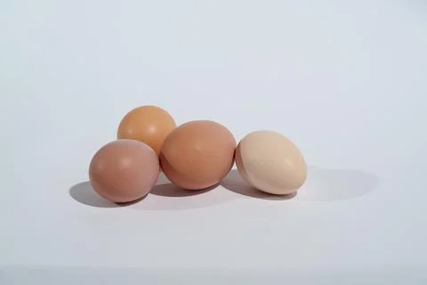 Chicken eggs with smooth shells in various natural Photos