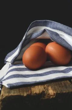 Chicken eggs on the table Stock Photos