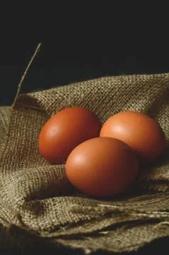 Chicken eggs on the table Stock Photos