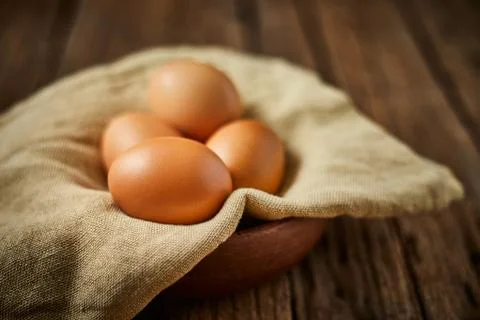 Chicken eggs on the table. Stock Photos