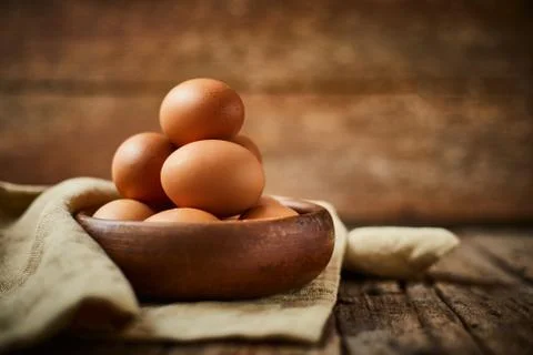 Chicken eggs on the table. Stock Photos