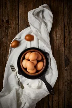 Chicken eggs on the table. Stock Photos