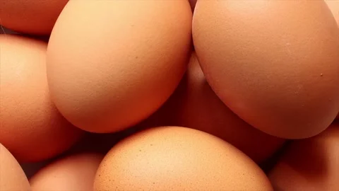 Chicken eggs texture background zooming in and seamless looping Stock Footage 141448940