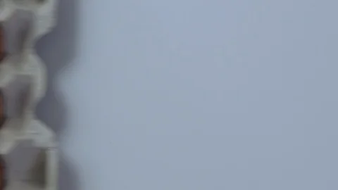 Chicken eggs in a tray glide into frame Stock Footage 108553414