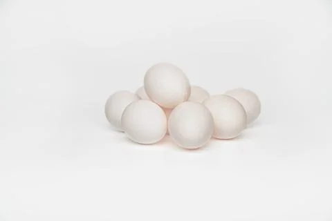 Chicken eggs on a white background Stock Photos